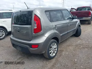 2012 Kia Soul + with VIN KNDJT2A65C7403493, listed as a IAAI auction lot 42095119 with 151,258 mi miles. Bid and sale history available at carsss.com. Image 4.