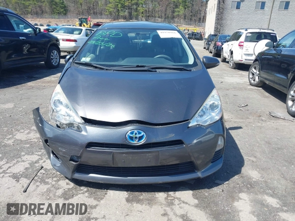 2014 Toyota Prius One z VIN JTDKDTB32E1070932, wystawiony jako IAAI lot #41950966 z przebiegiem 93 952 mil mil oraz . Historia ofert i sprzedaży dostępna na DreamBid. Obrazek 12.