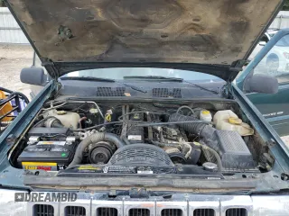 1998 Jeep Grand Cherokee Laredo with VIN 1J4GZ48S5WC289251, listed as a Copart auction lot 63594685 with 156,358 mi miles and Salvage title. Bid and sale history available at DreamBid. Image 12.