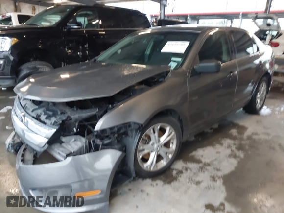 2012 Ford Fusion SE with VIN 3FAHP0HA8CR407618, listed as a IAAI auction lot 42199709 with 124,924 mi miles and . Bid and sale history available at DreamBid. Image 2.