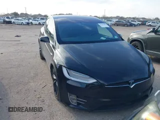 2019 Tesla Model X 75D with VIN 5YJXCBE21KF180203, listed as a IAAI auction lot 41606200 with 114,294 mi miles. Bid and sale history available at carsss.com. Image 1.
