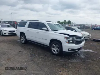 2018 Chevrolet Suburban LT z VIN 1GNSCHKC0JR181787, wystawiony jako IAAI lot #42039912 z przebiegiem 69 287 mil mil oraz . Historia ofert i sprzedaży dostępna na DreamBid. Obrazek 1.