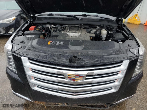 2017 Cadillac Escalade Platinum with VIN 1GYS4DKJ1HR325428, listed as a Copart auction lot 72035084 with 104,757 mi miles and Salvage Title. Bid and sale history available at carsss.com. Image 12.