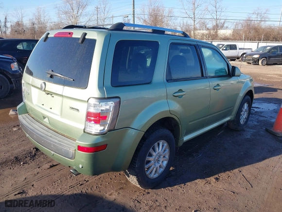 2010 Mercury Mariner Premier with VIN 4M2CN9H76AKJ09759, listed as a IAAI auction lot 41766694 with 119,546 mi miles. Bid and sale history available at carsss.com. Image 4.