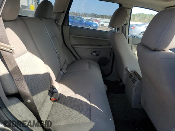2006 Jeep Grand Cherokee Laredo with VIN 1J4HS48N96C357909, listed as a Copart auction lot 77551154 with 136,235 mi miles and Salvage Title. Bid and sale history available at carsss.com. Image 11.