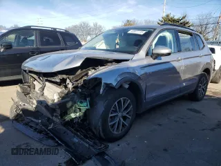 2021 Volkswagen Tiguan S with VIN 3VV1B7AX7MM005980, listed as a Copart auction lot 42827715 with 34,940 mi miles and Salvage Title. Bid and sale history available at DreamBid. Image 1.