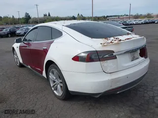 2012 Tesla Model S with VIN 5YJSA1DN6CFS00341, listed as a IAAI auction lot 41994114 with 1 mi miles. Bid and sale history available at carsss.com. Image 3.