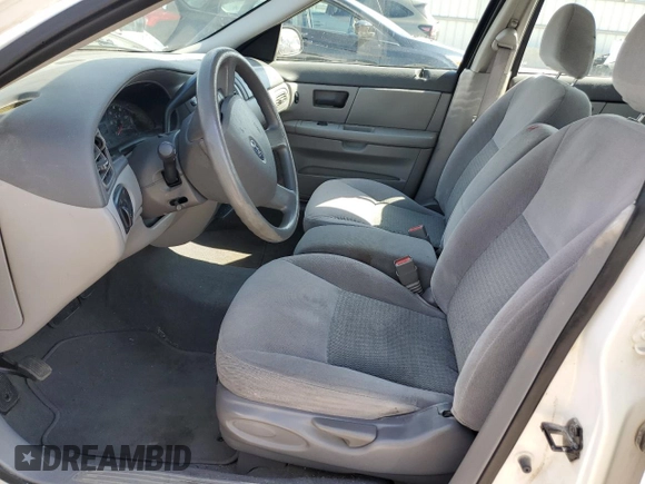 2006 Ford Taurus SE с VIN 1FAFP53U66A245685, выставлен на аукционе Copart как лот 53472415 с пробегом 100 110 миль миль и Списание • Salvage title. История ставок и продаж доступна на DreamBid. Изображение 7.
