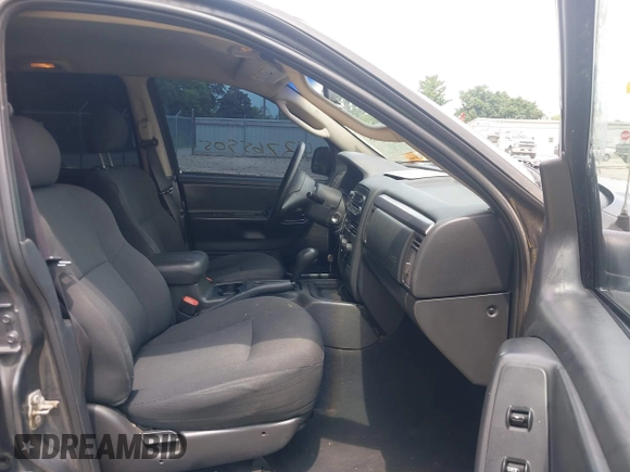 2004 Jeep Grand Cherokee Laredo with VIN 1J4GW48S44C352538, listed as a IAAI auction lot 42765905 with 249,220 mi miles and . Bid and sale history available at DreamBid. Image 5.