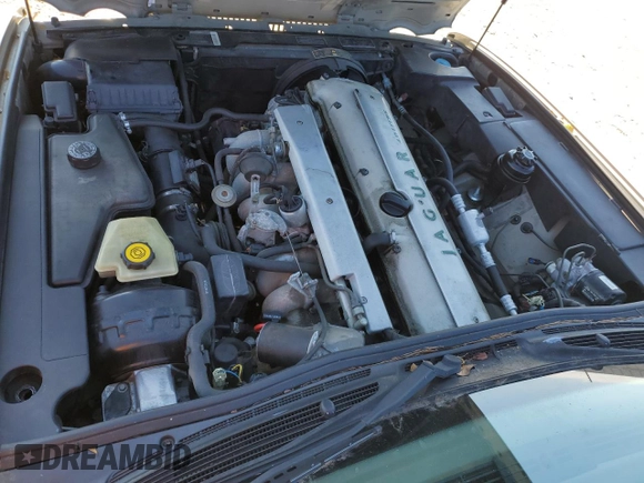1997 Jaguar XJ with VIN SAJHX6241VC795259, listed as a Copart auction lot 70752854 with Not provided miles and Salvage title. Bid and sale history available at DreamBid. Image 11.