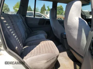 1993 Jeep Grand Cherokee Laredo с VIN 1J4GZ58S2PC654248, выставлен на аукционе Copart как лот 61259735 с пробегом 251 360 миль миль и Списание • Salvage title. История ставок и продаж доступна на DreamBid. Изображение 11.