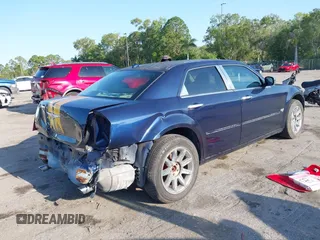 2005 Chrysler 300 300C AWD z VIN 2C3AK63H05H672425, wystawiony jako IAAI lot #42224241 z przebiegiem 143 185 mil mil oraz . Historia ofert i sprzedaży dostępna na DreamBid. Obrazek 4.