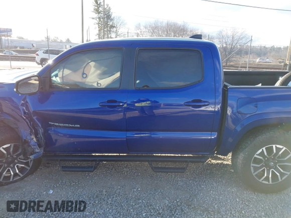 2023 Toyota Tacoma 4WD SR with VIN 3TYCZ5AN1PT119133, listed as a IAAI auction lot 41574906 with 19,887 mi miles. Bid and sale history available at carsss.com. Image 13.