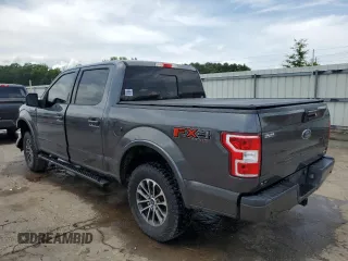 2018 Ford F-150 XL with VIN 1FTEW1EG7JFC40015, listed as a Copart auction lot 60659755 with 194,645 mi miles and Salvage title. Bid and sale history available at DreamBid. Image 2.
