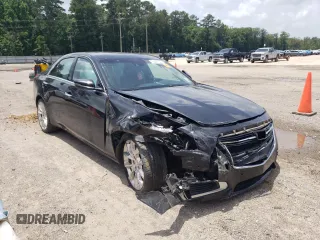 2015 Cadillac CTS Premium AWD with VIN 1G6AZ5S38F0116993, listed as a Copart auction lot 63087095 with 100,533 mi miles and Salvage title. Bid and sale history available at DreamBid. Image 4.