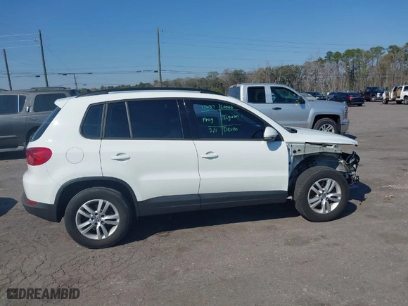 2017 Volkswagen Tiguan S with VIN WVGAV7AX9HK029583, listed as a IAAI auction lot 41684339 with 96,807 mi miles. Bid and sale history available at carsss.com. Image 13.
