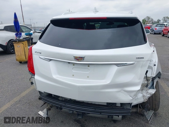 2017 Cadillac XT5 Premium Luxury FWD z VIN 1GYKNCRS3HZ307728, wystawiony jako IAAI lot #42203542 z przebiegiem 50 433 mil mil oraz . Historia ofert i sprzedaży dostępna na DreamBid. Obrazek 6.