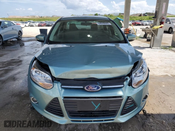2012 Ford Focus SE с VIN 1FAHP3F21CL254804, выставлен на аукционе Copart как лот 59048665 с пробегом 117 566 миль миль и Списание • Salvage title. История ставок и продаж доступна на DreamBid. Изображение 5.