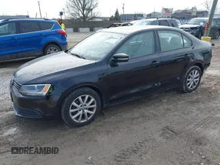 2012 Volkswagen Jetta Sedan SE w/Convenience with VIN 3VWDX7AJ5CM398348, listed as a IAAI auction lot 41708085 with 147,477 mi miles. Bid and sale history available at carsss.com. Image 2.
