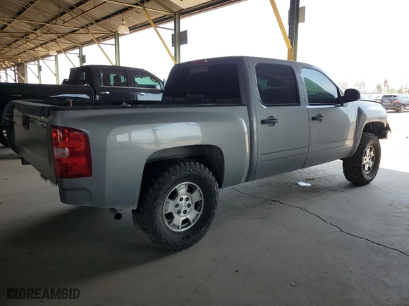 2007 Chevrolet Silverado 1500 LTZ with VIN 2GCFK13Y471505534, listed as a Copart auction lot 64821524 with 215,107 mi miles and Salvage Title. Bid and sale history available at carsss.com. Image 3.