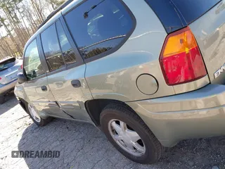 2003 GMC Envoy SLT with VIN 1GKDS13S432373988, listed as a IAAI auction lot 41840744 with 221,306 mi miles. Bid and sale history available at carsss.com. Image 14.
