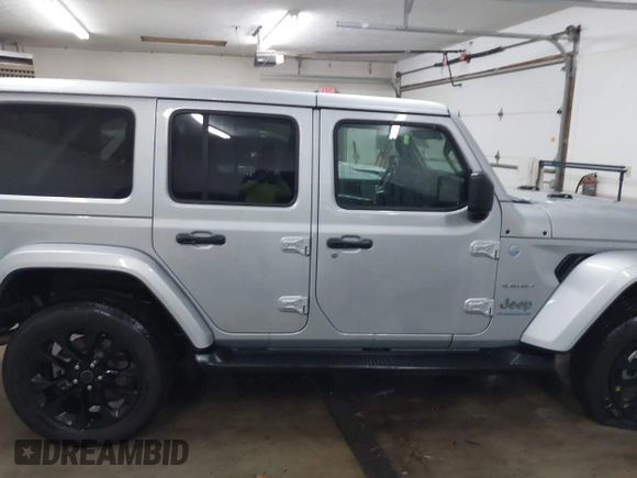 2024 Jeep Wrangler Sahara with VIN 1C4RJXP63RW202929, listed as a IAAI auction lot 41002346 with 12,332 mi miles and . Bid and sale history available at DreamBid. Image 14.