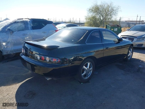 1999 Lexus SC 400 Luxury Sport Cpe with VIN JT8CH32Y4X1002413, listed as a IAAI auction lot 41331493 with 163,061 mi miles. Bid and sale history available at carsss.com. Image 4.