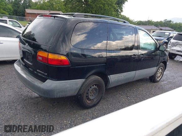 1998 Toyota Sienna LE with VIN 4T3ZF13C6WU016001, listed as a IAAI auction lot 42604162 with 214,491 mi miles and . Bid and sale history available at DreamBid. Image 4.