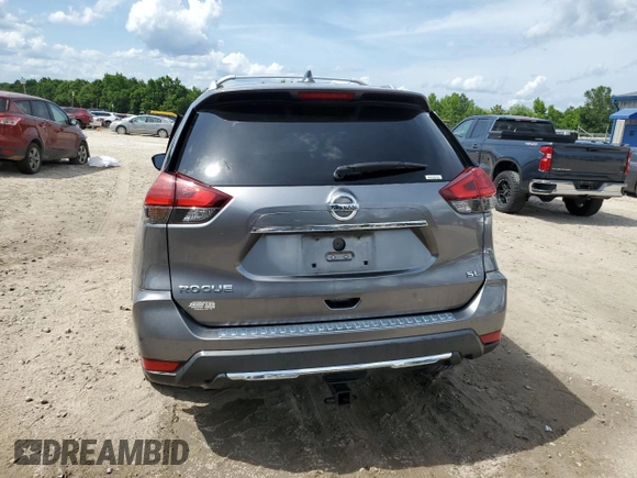 2017 Nissan Rogue S z VIN JN8AT2MT2HW404698, wystawiony jako Copart lot #58554905 z przebiegiem 146 650 mil mil oraz Szkoda całkowita • Salvage title. Historia ofert i sprzedaży dostępna na DreamBid. Obrazek 6.