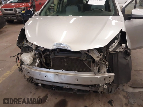 2013 Toyota Yaris L with VIN JTDKTUD36DD557084, listed as a IAAI auction lot 41502228 with 174,185 mi miles. Bid and sale history available at carsss.com. Image 6.