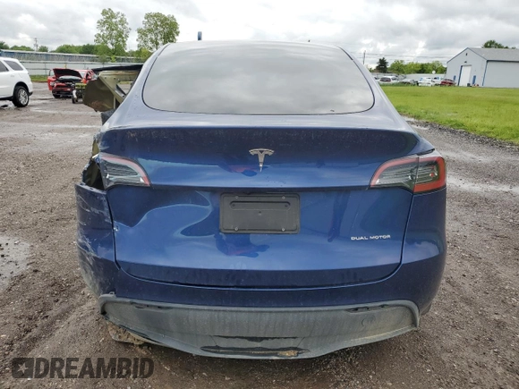 2024 Tesla Model Y Long Range z VIN 7SAYGDEE0RA286070, wystawiony jako Copart lot #58200425 z przebiegiem 16 881 mil mil oraz Szkoda całkowita • Salvage title. Historia ofert i sprzedaży dostępna na DreamBid. Obrazek 6.