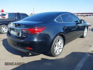 2017 Mazda Mazda6 Touring with VIN JM1GL1V55H1155696, listed as a IAAI auction lot 42003172 with 95,300 mi miles. Bid and sale history available at carsss.com. Image 4.