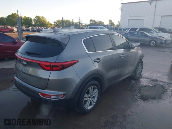 2017 Kia Sportage LX with VIN KNDPM3AC0H7081405, listed as a IAAI auction lot 41791011 with 119,768 mi miles and . Bid and sale history available at DreamBid. Image 4.