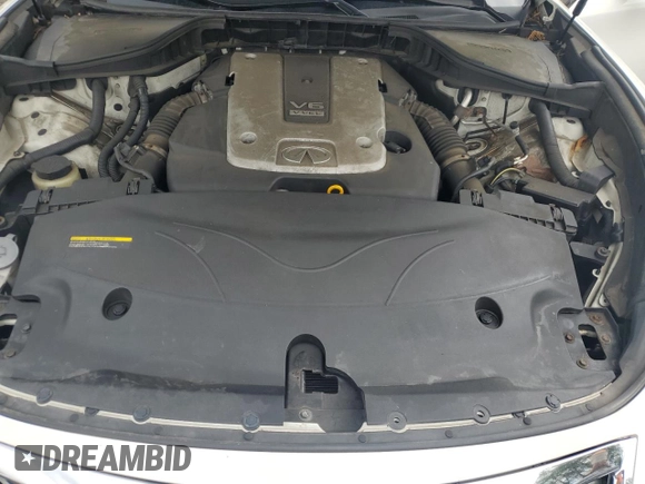 2015 Infiniti Q70 z VIN JN1BY1AR1FM561445, wystawiony jako Copart lot #58377655 z przebiegiem 202 174 mil mil oraz Szkoda całkowita • Salvage title. Historia ofert i sprzedaży dostępna na DreamBid. Obrazek 11.