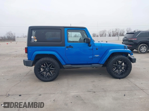 2014 Jeep Wrangler Arctic z VIN 1C4GJWBG3EL313350, wystawiony jako IAAI lot #41442520 z przebiegiem Nie podano mil oraz . Historia ofert i sprzedaży dostępna na DreamBid. Obrazek 13.