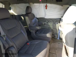 2007 Honda Odyssey EX-L with VIN 5FNRL38627B132925, listed as a IAAI auction lot 41793141 with 168,000 mi miles. Bid and sale history available at carsss.com. Image 8.