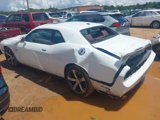 2014 Dodge Challenger R/T Plus z VIN 2C3CDYBT9EH293136, wystawiony jako IAAI lot #42264180 z przebiegiem 71 696 mil mil oraz . Historia ofert i sprzedaży dostępna na DreamBid. Obrazek 3.
