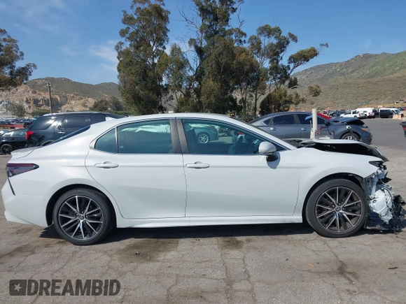 2023 Toyota Camry SE with VIN 4T1T11AK8PU138805, listed as a IAAI auction lot 41977827 with 19,661 mi miles and . Bid and sale history available at DreamBid. Image 14.