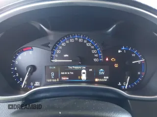2014 Cadillac SRX Premium Collection z VIN 3GYFNDE31ES653114, wystawiony jako IAAI lot #42107858 z przebiegiem 125 192 mil mil oraz . Historia ofert i sprzedaży dostępna na DreamBid. Obrazek 7.
