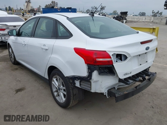 2016 Ford Focus SE with VIN 1FADP3F24GL346445, listed as a IAAI auction lot 42101322 with 30,354 mi miles. Bid and sale history available at carsss.com. Image 3.