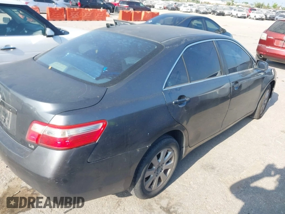2007 Toyota Camry CE z VIN 4T1BE46K37U140603, wystawiony jako IAAI lot #42305937 z przebiegiem 244 141 mil mil oraz . Historia ofert i sprzedaży dostępna na DreamBid. Obrazek 4.