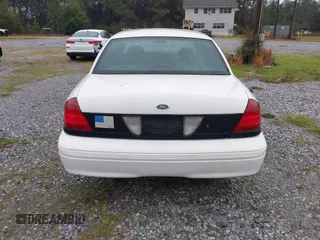 2005 Ford Police Interceptor z VIN 2FAFP71W25X139210, wystawiony jako IAAI lot #41609177 z przebiegiem 114 755 mil mil oraz . Historia ofert i sprzedaży dostępna na DreamBid. Obrazek 16.