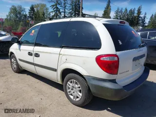 2005 Dodge Caravan SE with VIN 1D4GP25R55B298363, listed as a IAAI auction lot 42068006 with 306,997 mi miles. Bid and sale history available at carsss.com. Image 3.