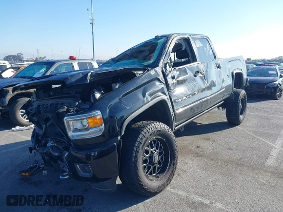 2019 GMC Sierra 2500HD Denali with VIN 1GT12SEYXKF222893, listed as a IAAI auction lot 41722342 with 114,613 mi miles. Bid and sale history available at carsss.com. Image 2.