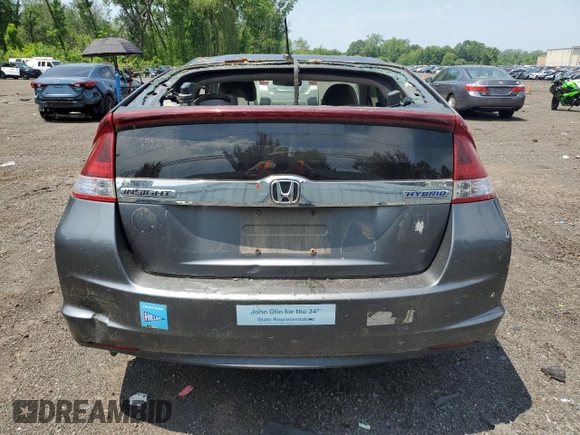 2013 Honda Insight z VIN JHMZE2H31DS000827, wystawiony jako Copart lot #60745645 z przebiegiem 172 694 mil mil oraz Szkoda całkowita • Salvage title. Historia ofert i sprzedaży dostępna na DreamBid. Obrazek 6.