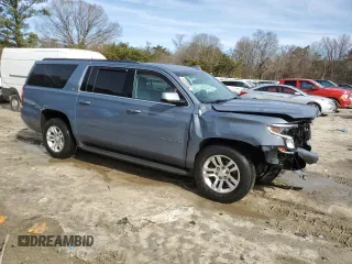 2015 Chevrolet Suburban LT with VIN 1GNSKJKC0FR646425, listed as a Copart auction lot 44880954 with 116,995 mi miles and . Bid and sale history available at DreamBid. Image 4.