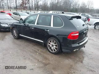2008 Porsche Cayenne Turbo with VIN WP1AC29P28LA97203, listed as a IAAI auction lot 41541313 with 192,281 mi miles. Bid and sale history available at carsss.com. Image 3.