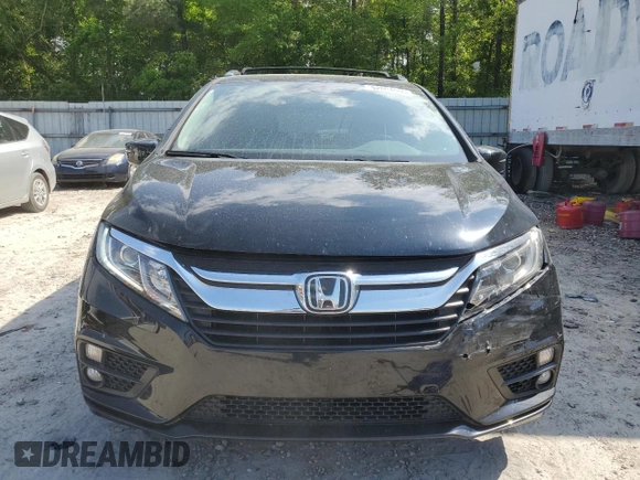 2019 Honda Odyssey EX-L with VIN 5FNRL6H73KB103467, listed as a Copart auction lot 52604005 with 101,892 mi miles and Salvage Title. Bid and sale history available at DreamBid. Image 5.