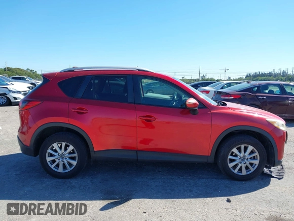 2015 Mazda CX-5 Touring with VIN JM3KE2CY5F0542184, listed as a IAAI auction lot 41770264 with 119,592 mi miles. Bid and sale history available at carsss.com. Image 13.