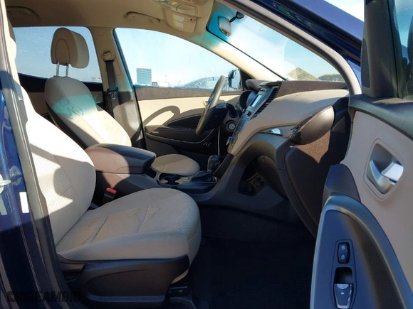 2018 Hyundai Santa Fe Sport 2.4L with VIN 5XYZTDLB6JG527779, listed as a IAAI auction lot 41611963 with 136,722 mi miles. Bid and sale history available at carsss.com. Image 5.